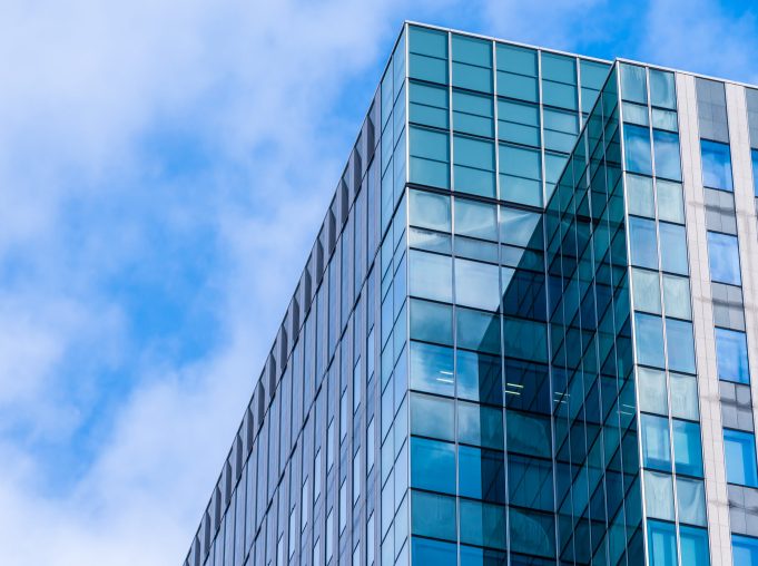 Beautiful architecture skyscraper office business building with glass window shape